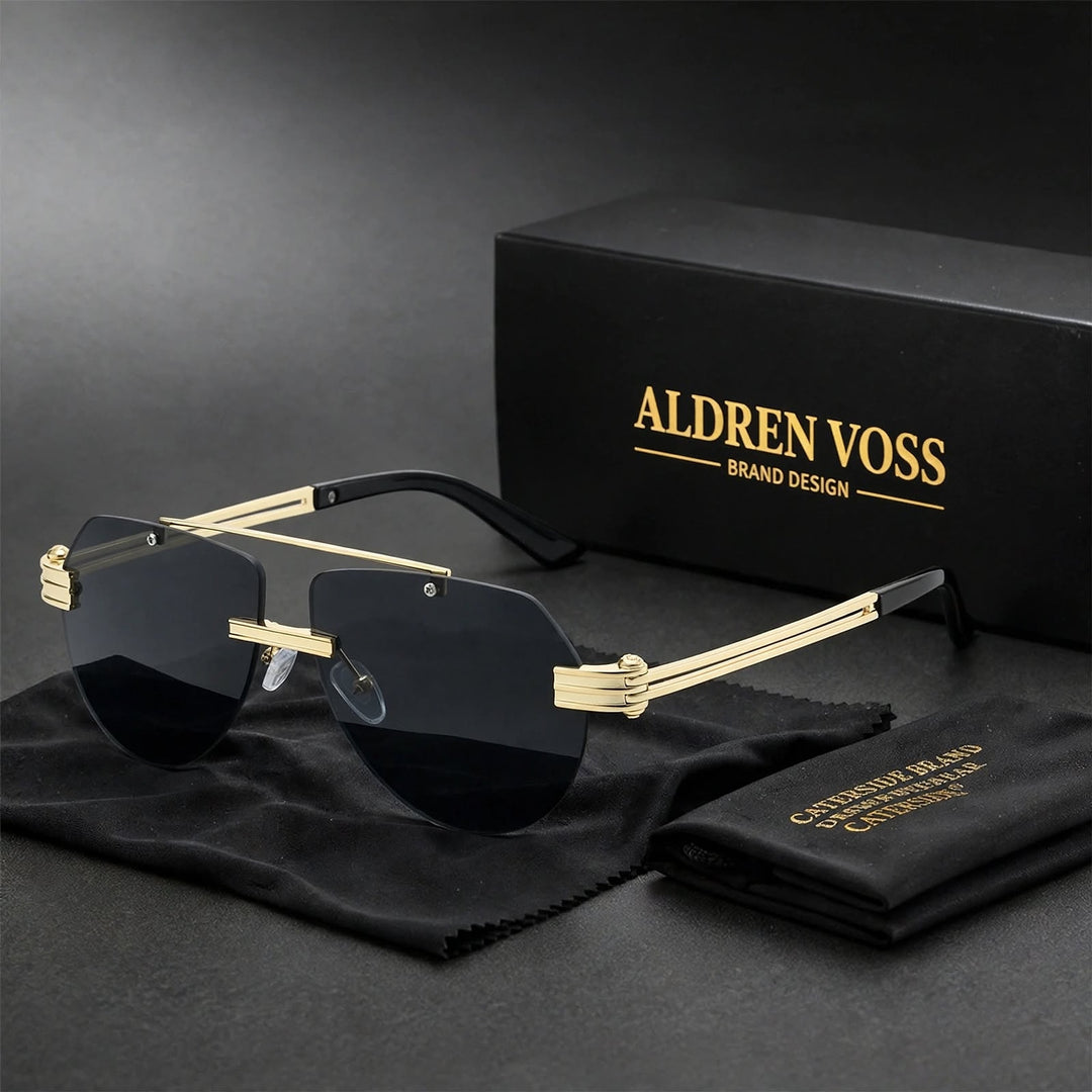 Gold frame sunglasses with dark smoky gray lenses and black matte ear tips.