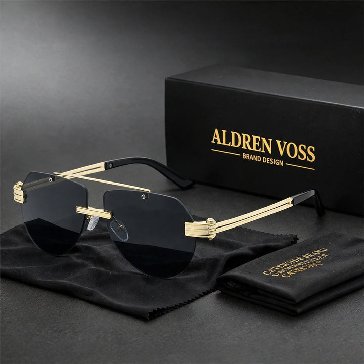 Gold frame sunglasses with dark smoky gray lenses and black matte ear tips.