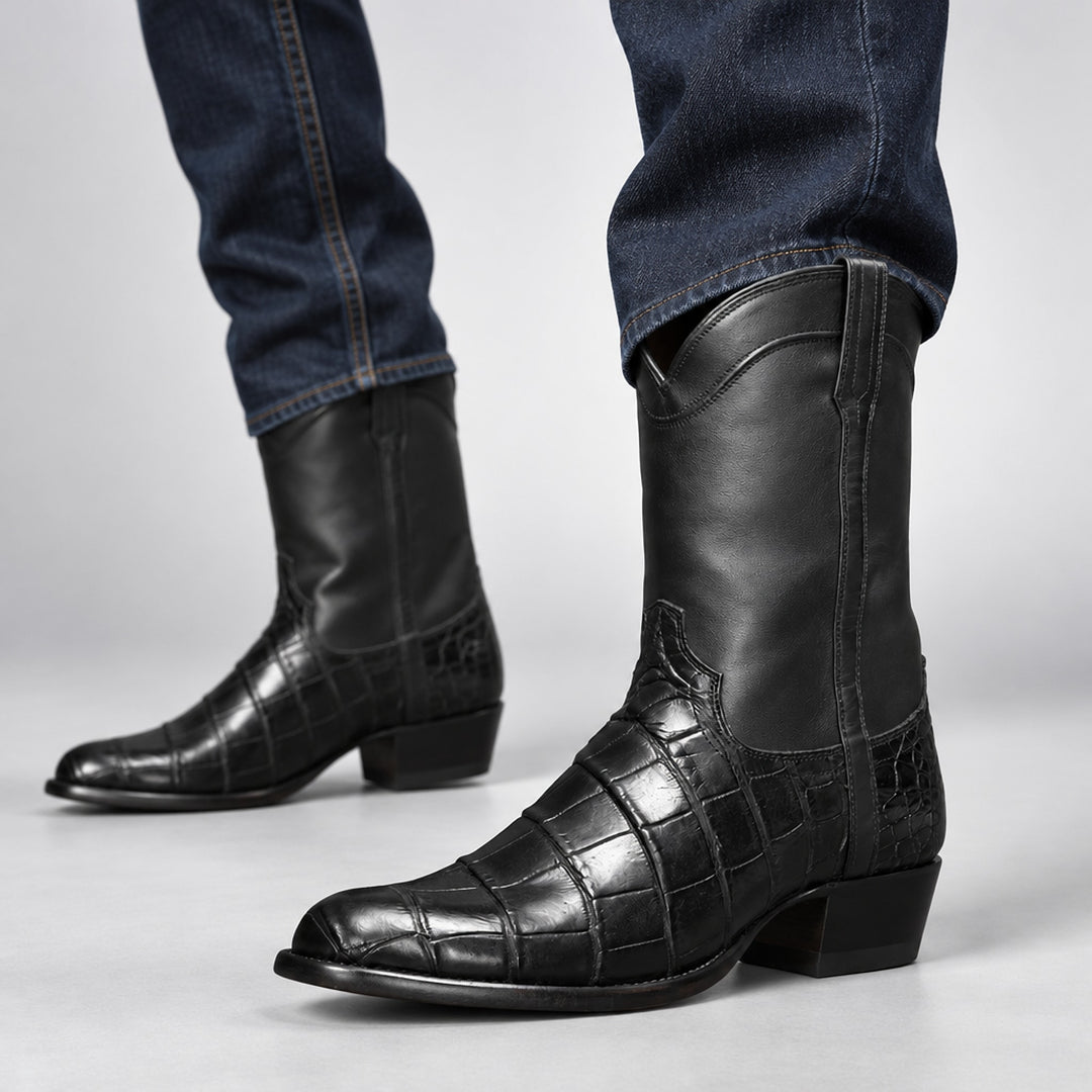 Black mid-calf western boots with glossy upper and glossy reptile-pattern panel on lower part. (on model)