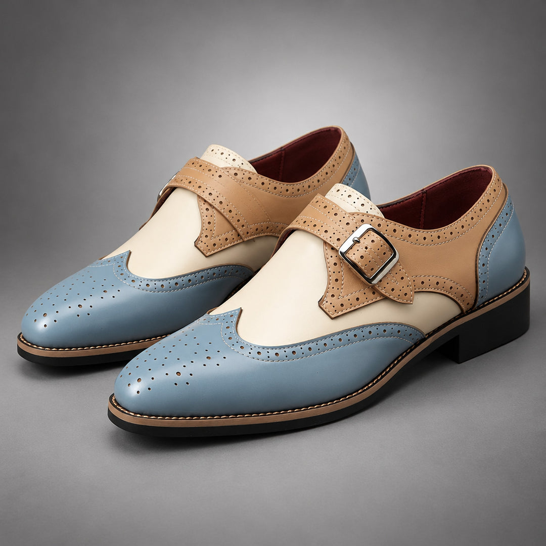 Loafers in light blue and beige with cream detail stitching and a silver buckle.