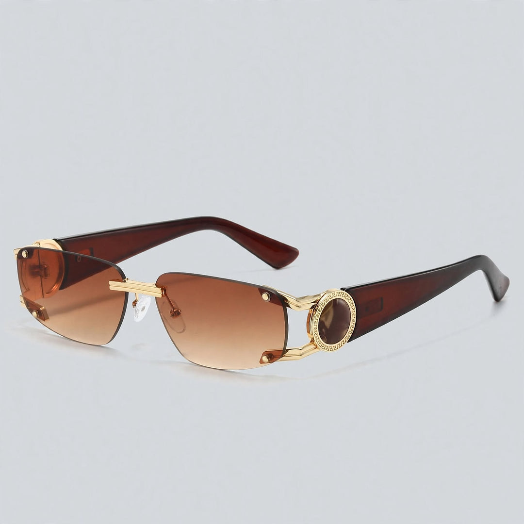 These sunglasses have shiny brown temples, gold metal details, and brown tinted lenses.