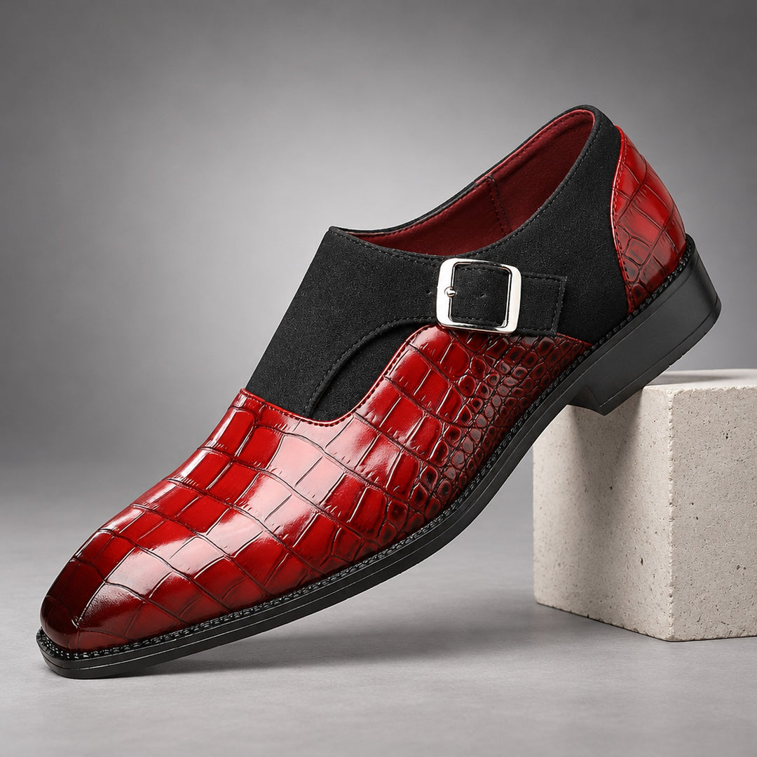 Glossy crocodile pattern burgundy loafers with a silver buckle and black sole.