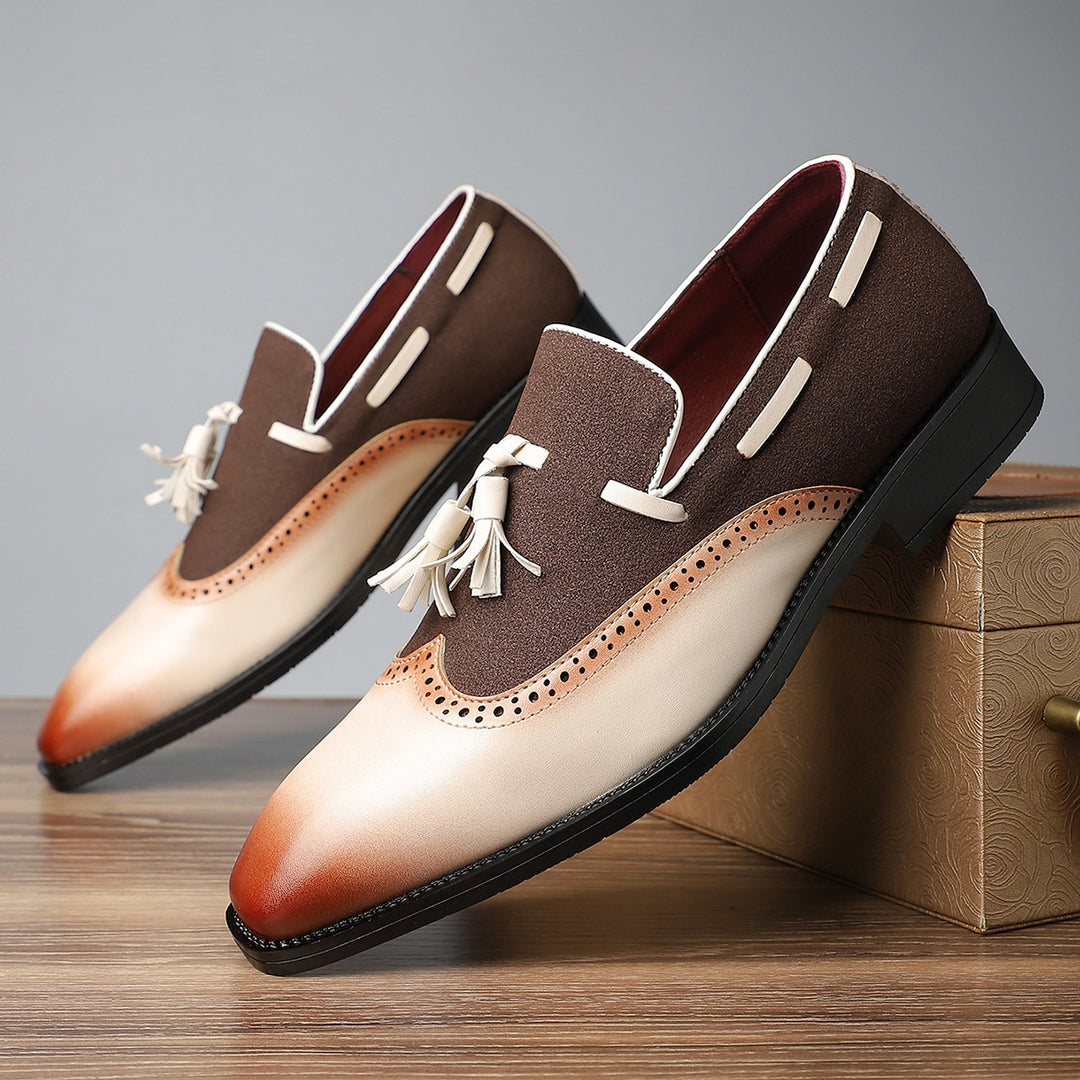 Dark brown and cream shoes with tan accents and a matte finish, detailed with matching stitching.
