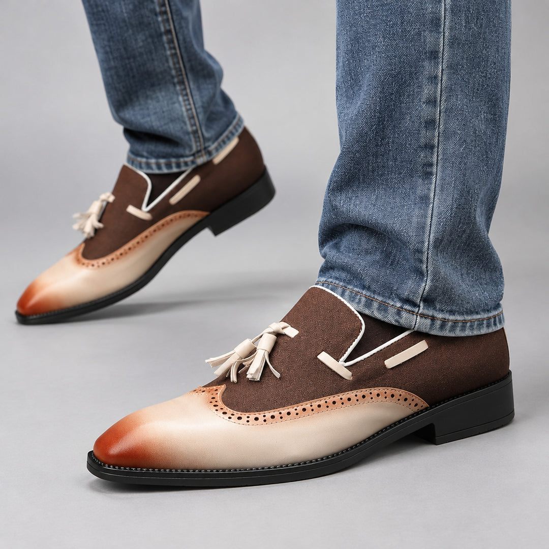 Dark brown and cream shoes with tan accents and a matte finish, detailed with matching stitching. (on model)