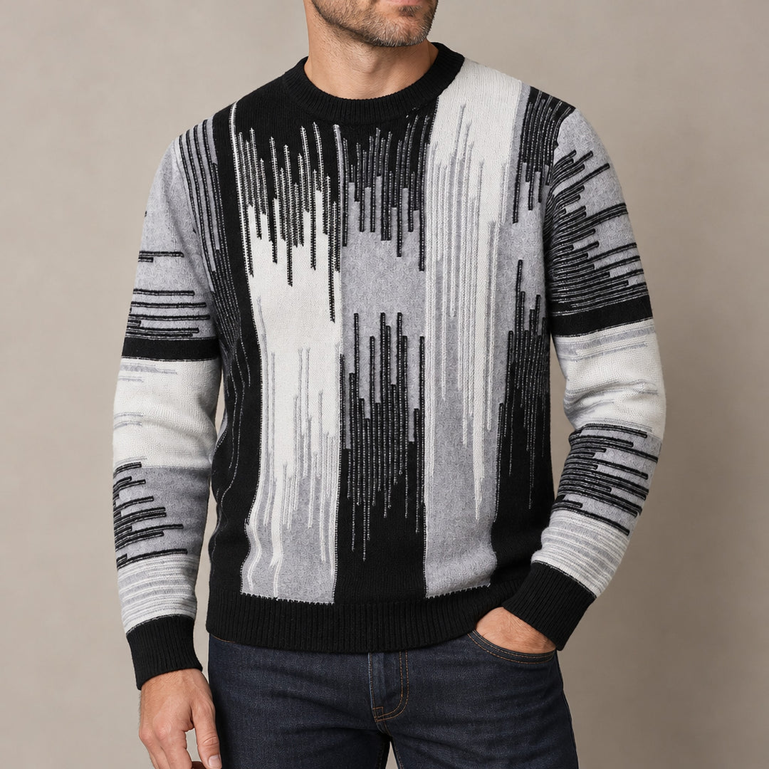 Black, light gray, medium gray, and off-white striped sweater with black ribbed trims. (on model crop)
