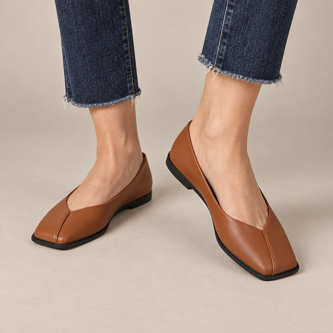 Mirana Leather Flats in Light Brown (on model legs)