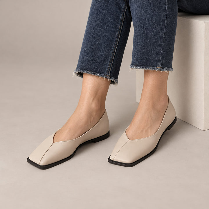 Mirana Leather Flats in Off-white (on model legs)
