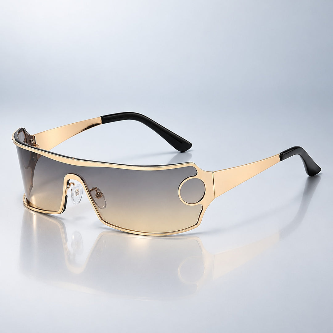 Wraparound sunglasses with a shiny gold frame and gradient brown lens, fading light at the bottom.