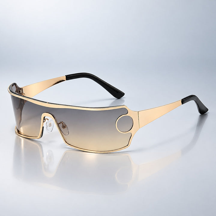 Wraparound sunglasses with a shiny gold frame and gradient brown lens, fading light at the bottom.