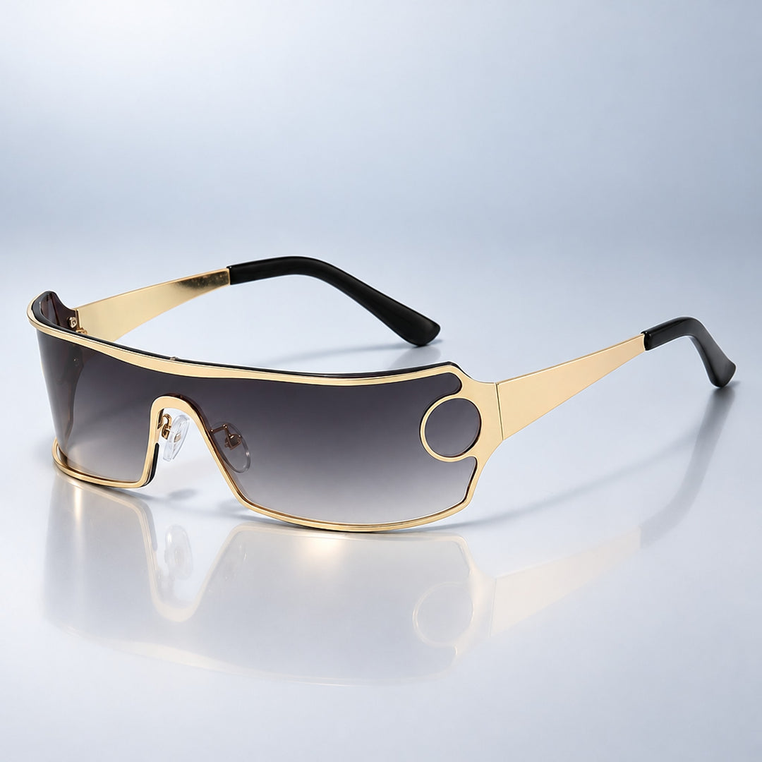 Wraparound sunglasses with a light gold frame and gradient gray lens, darkest at the top.