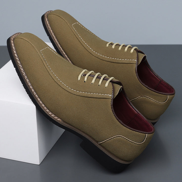 Matte olive green oxfords with light beige stitching and a black sole edged in brown. (photo 2)