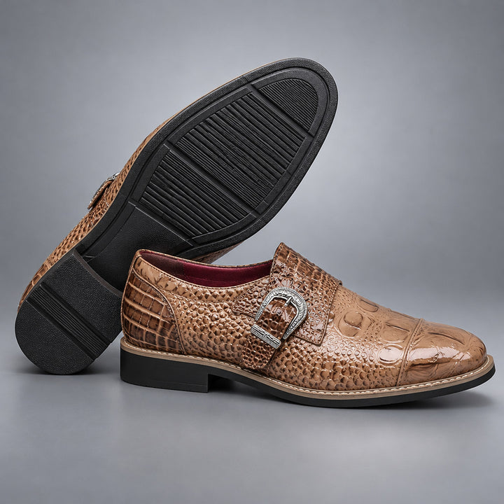 Glossy brown loafers with caramel shading, black sole, beige stitched edge and crocodile pattern upper. (sole)