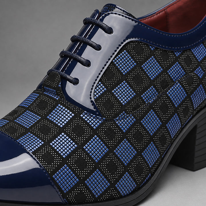 Glossy navy blue and black checkerboard oxfords with a black sole. (detail macro)