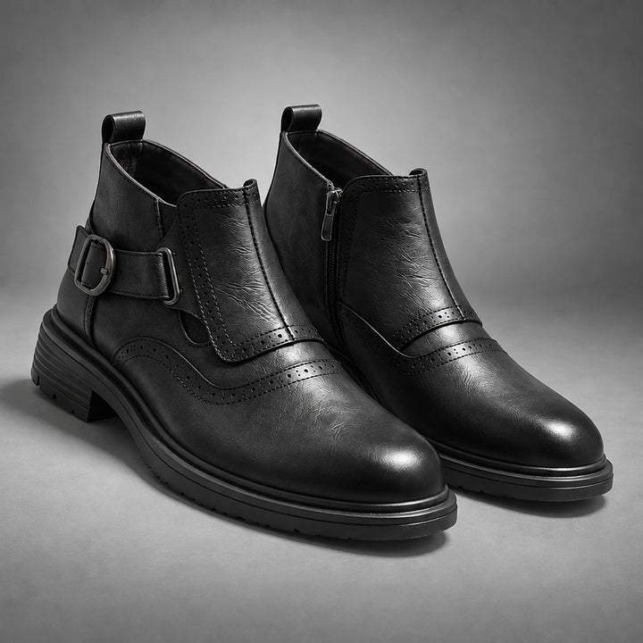 Boot in smooth black leather with black sole and a gunmetal buckle.