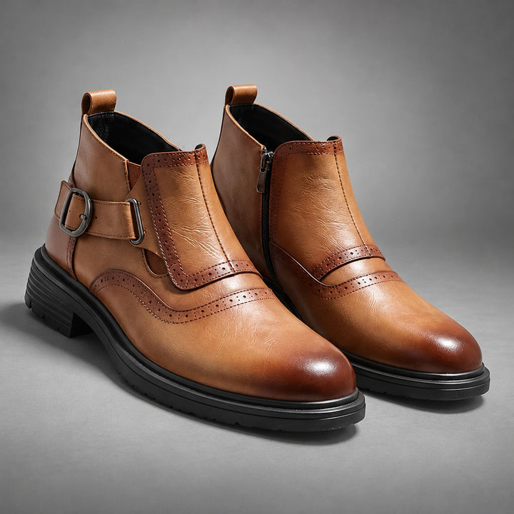 Boot in warm brown leather with a dark brown fade at the toe and strap edges, black sole and gunmetal buckle.